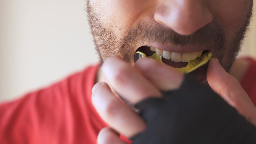 Man Wearing A Mouthguard